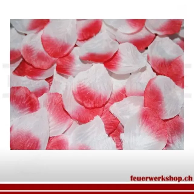 Artificial rose petals mixed in white and red